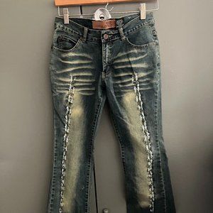 Early 2000s ripped jeans.  Size 5